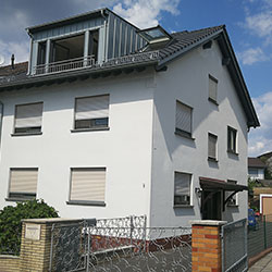 Ansicht der Immobilie in Haibach nach der Erweiterung - Ansicht Straßenseite Ansicht der Immobilie in Haibach nach der Erweiterung - Ansicht Straßenseite